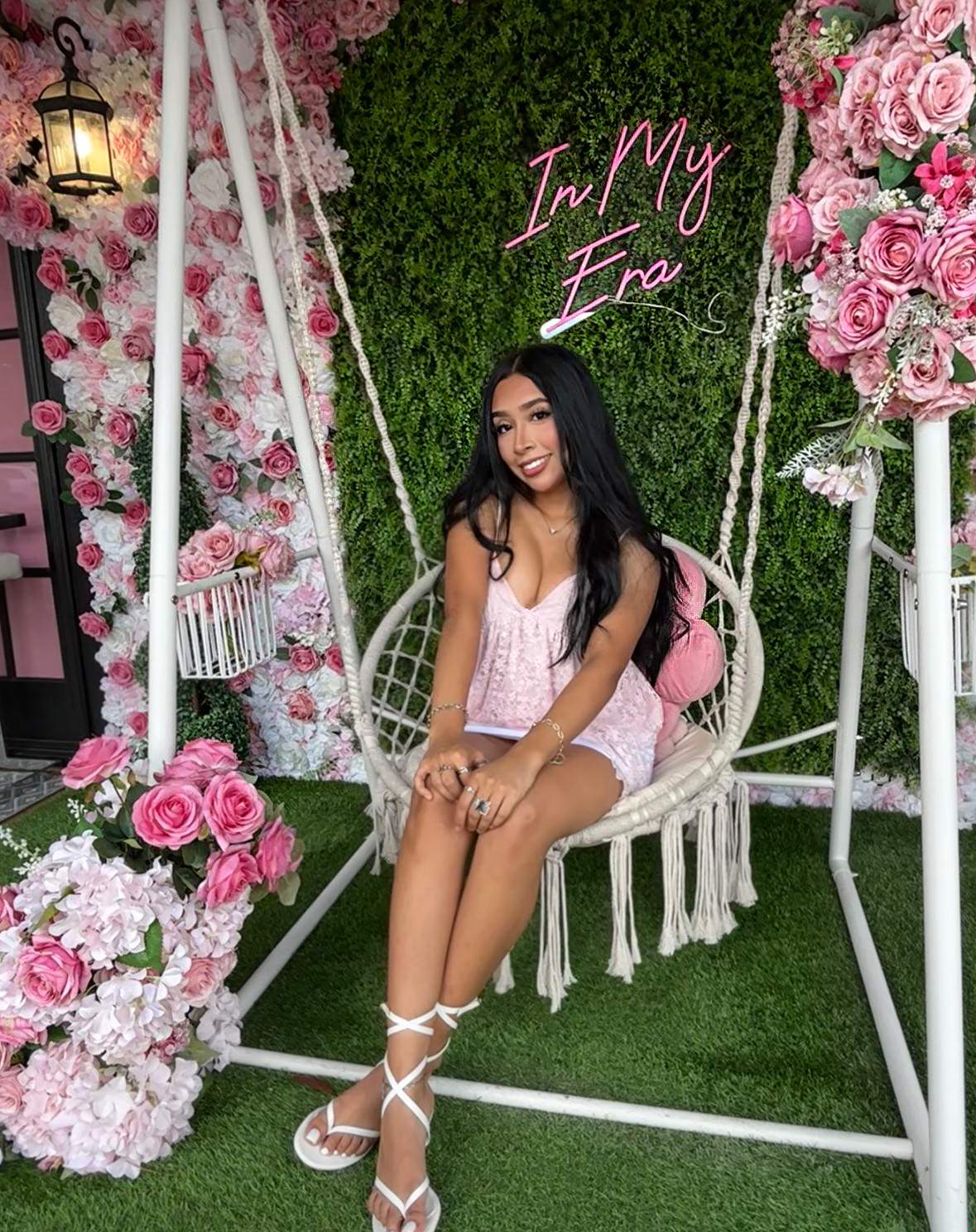 Arely arranging flowers in her studio
